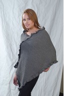 Channeled poncho with V-formed neck and ruffles