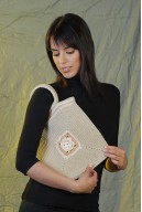 Crochet knitted bag with a flower made with organic cotton