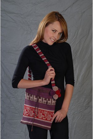 Bag with pompons and shapes